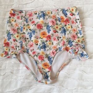 Kortni Jeane high waisted swimmer bottoms.